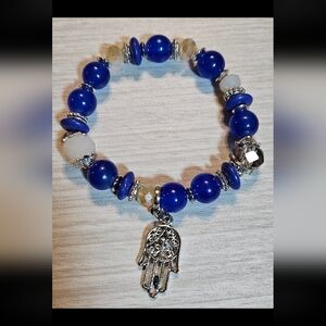 Blue Beaded Bracelet with Silver Charm